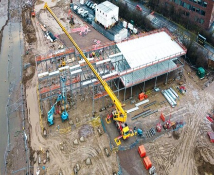 Hopescourt week 17 aerial view of site with crane